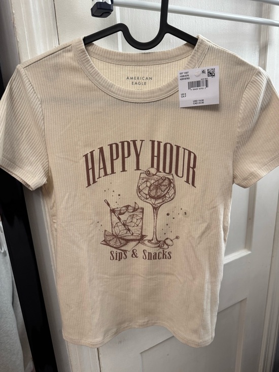 American Eagle Outfitters Tops - AE 'Happy Hour' Graphic Hey Baby Tee - Cream